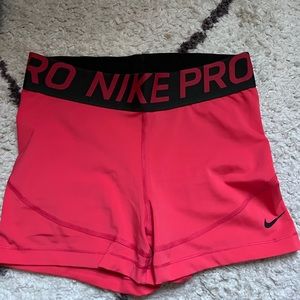 Pink Nike pro shorts